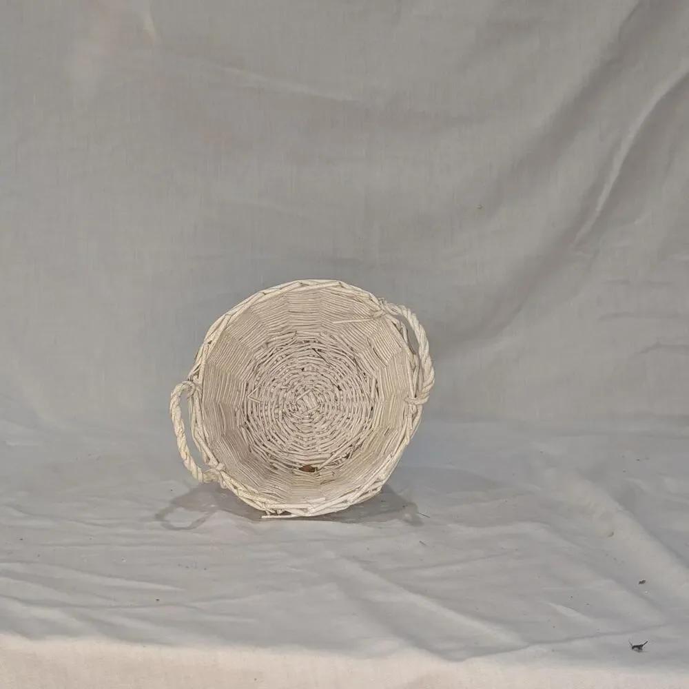 White wicker basket with handles